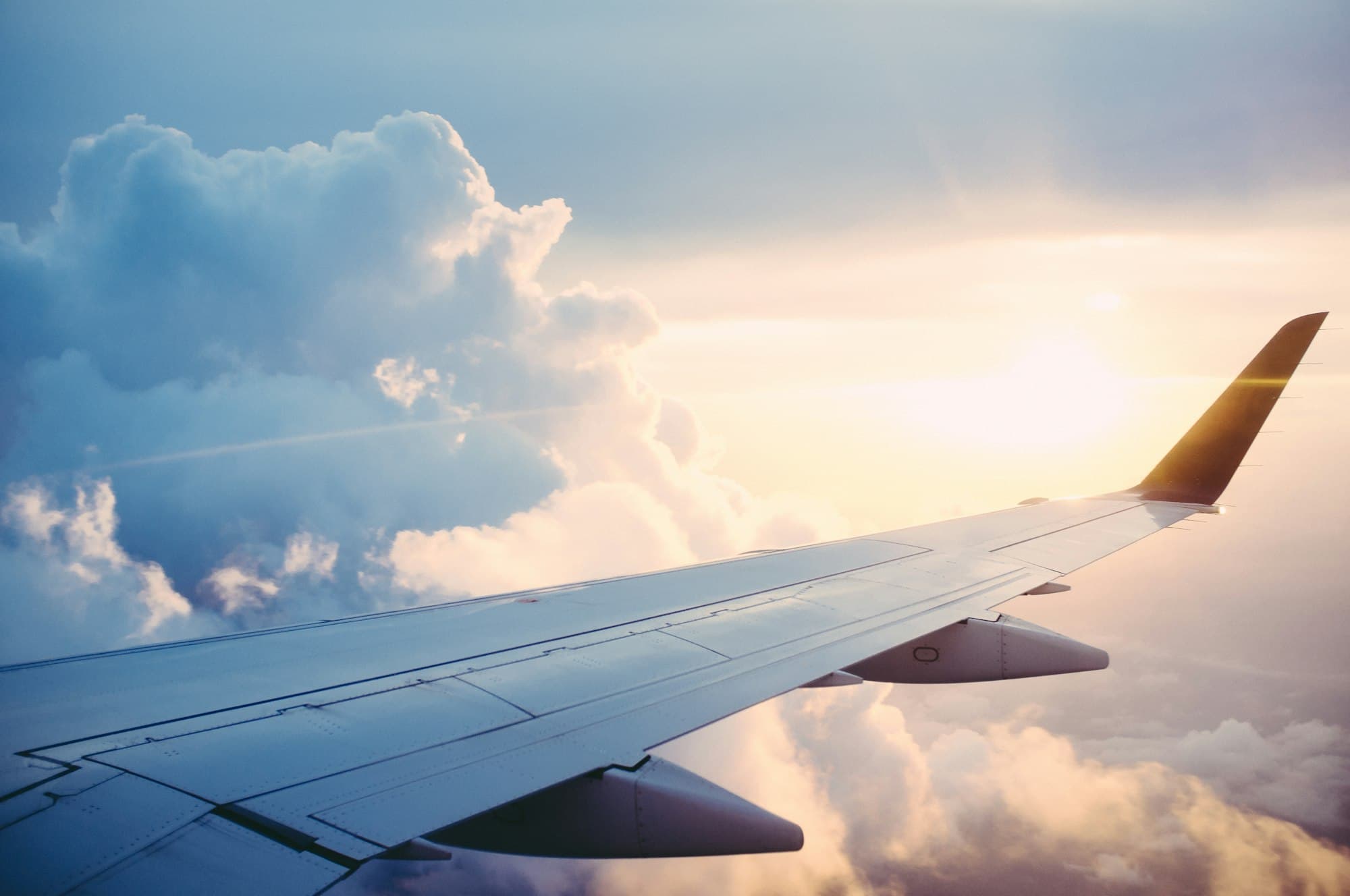 A view from an aircraft wing above the clouds